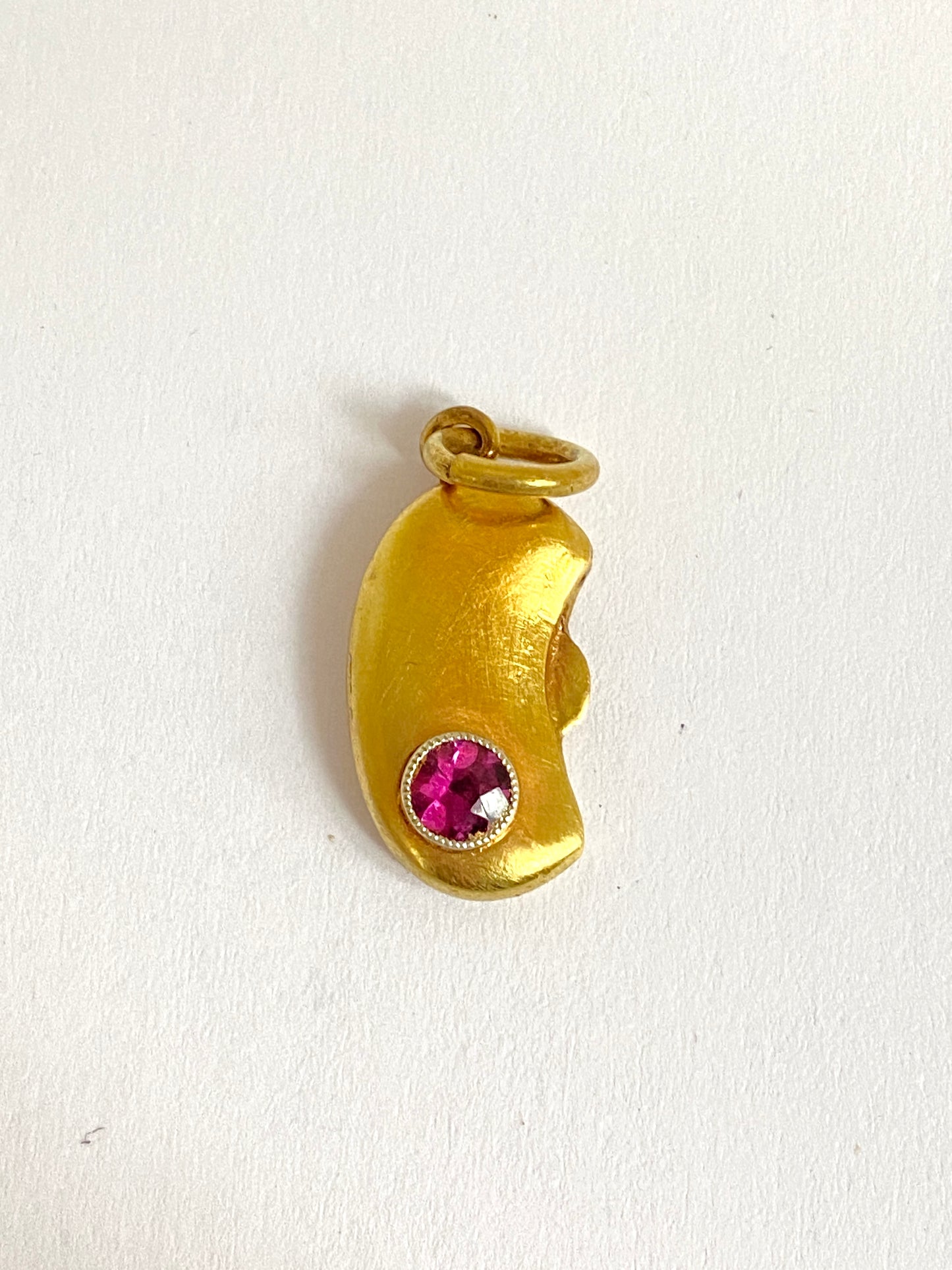 Antique, 9ct Gold, Kidney Bean (Lucky Charm), with a rare, Purple Garnet, Hallmarked 9ct Gold, Birmingham, 1914