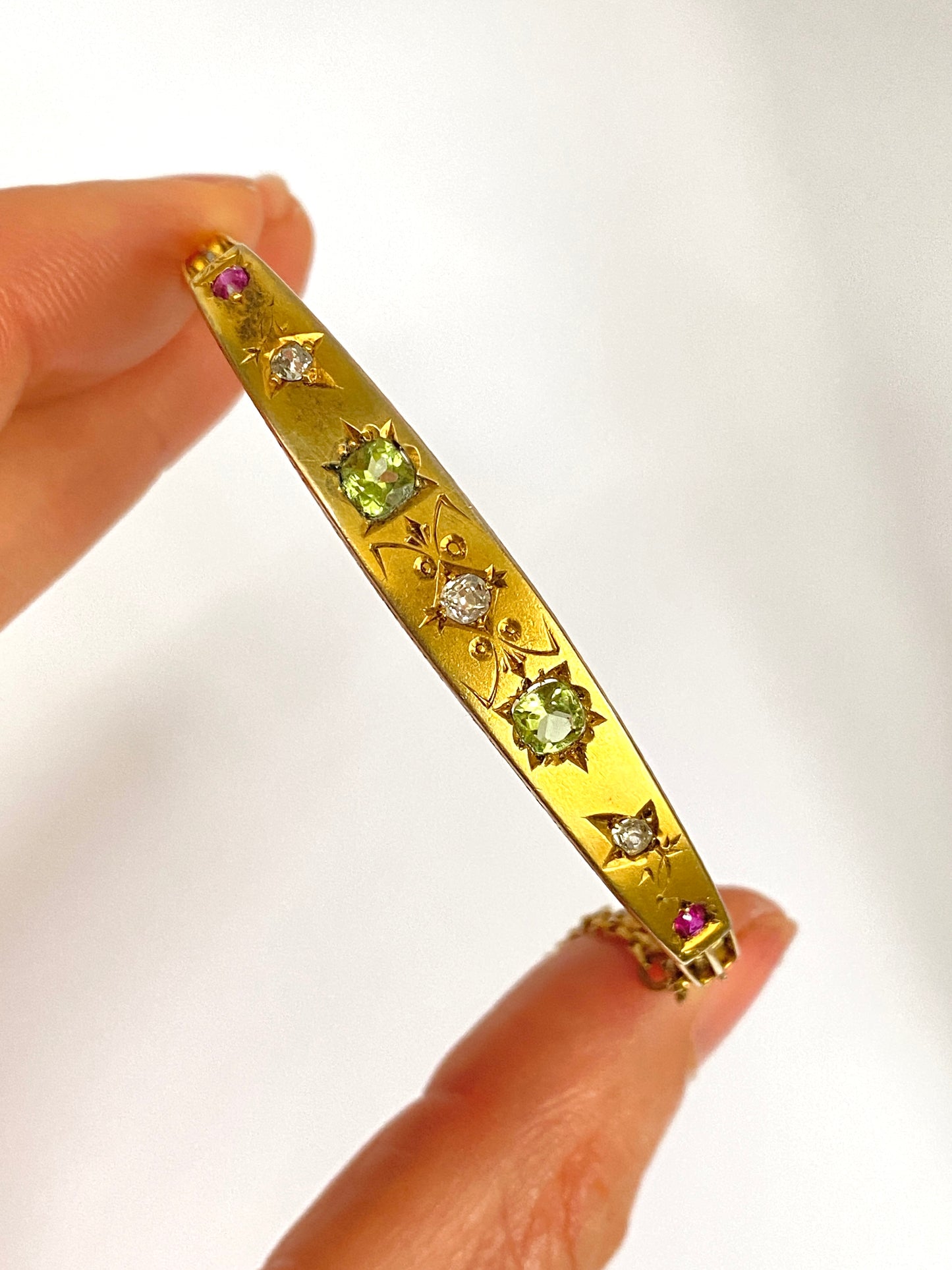 Antique, 9ct Gold, Diamond, Peridot and Ruby Starburst Bangle. 9.08g