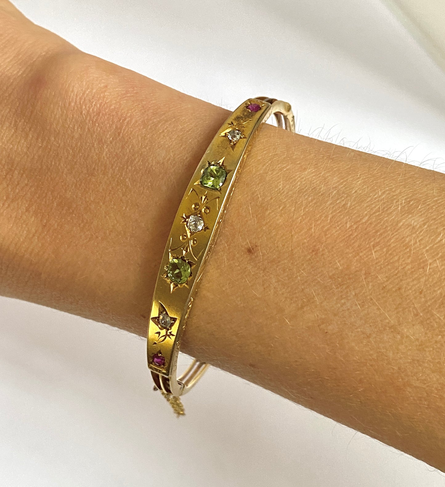 Antique, 9ct Gold, Diamond, Peridot and Ruby Starburst Bangle. 9.08g