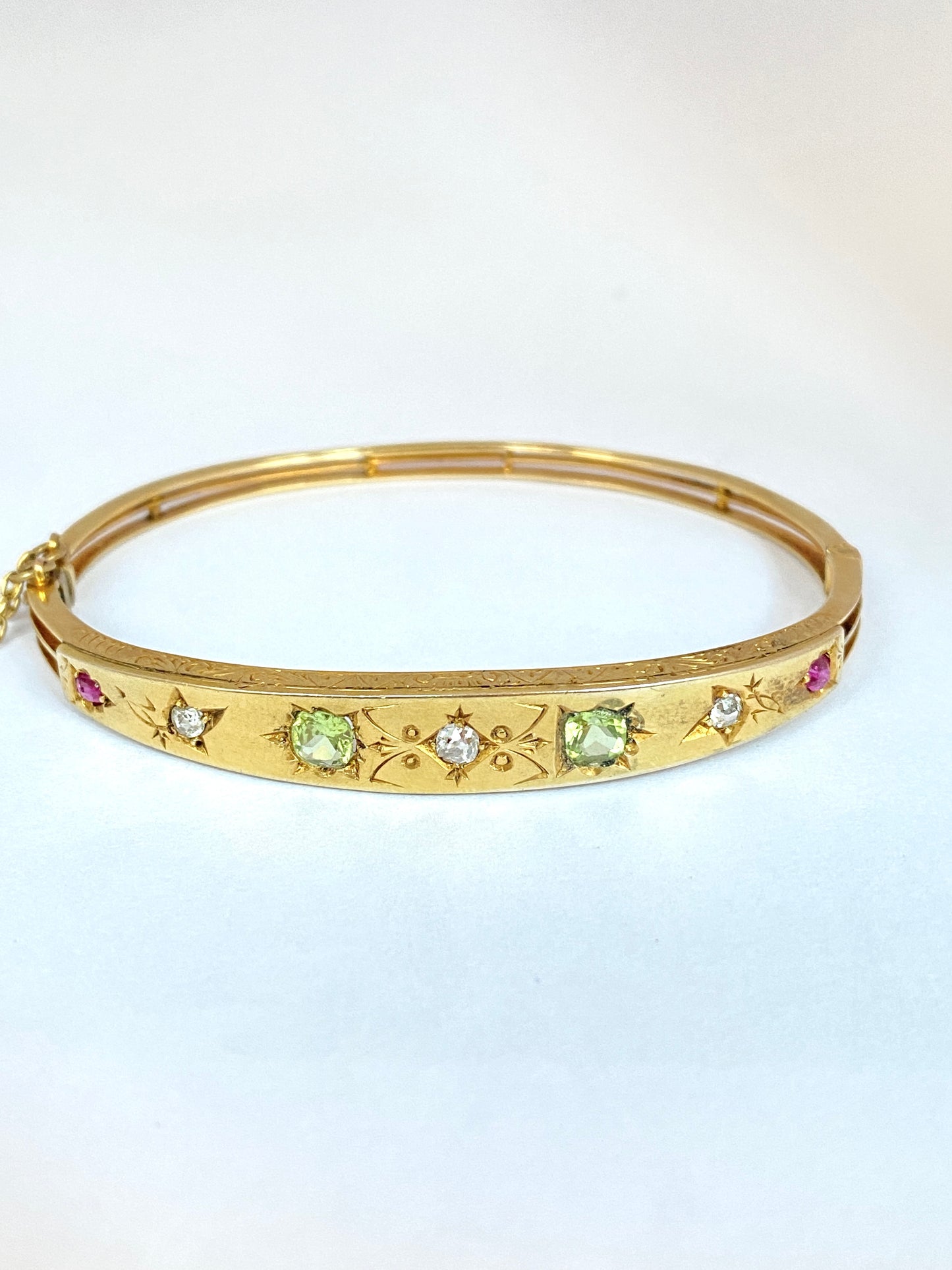 Antique, 9ct Gold, Diamond, Peridot and Ruby Starburst Bangle. 9.08g