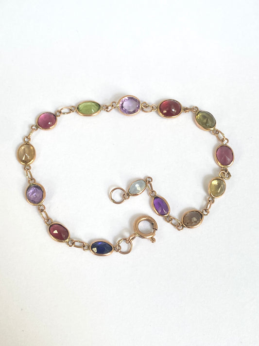 Vintage, 9ct Gold, Multi Gem Bracelet featuring, Peridot, Garnet, Amethyst, and Zircon