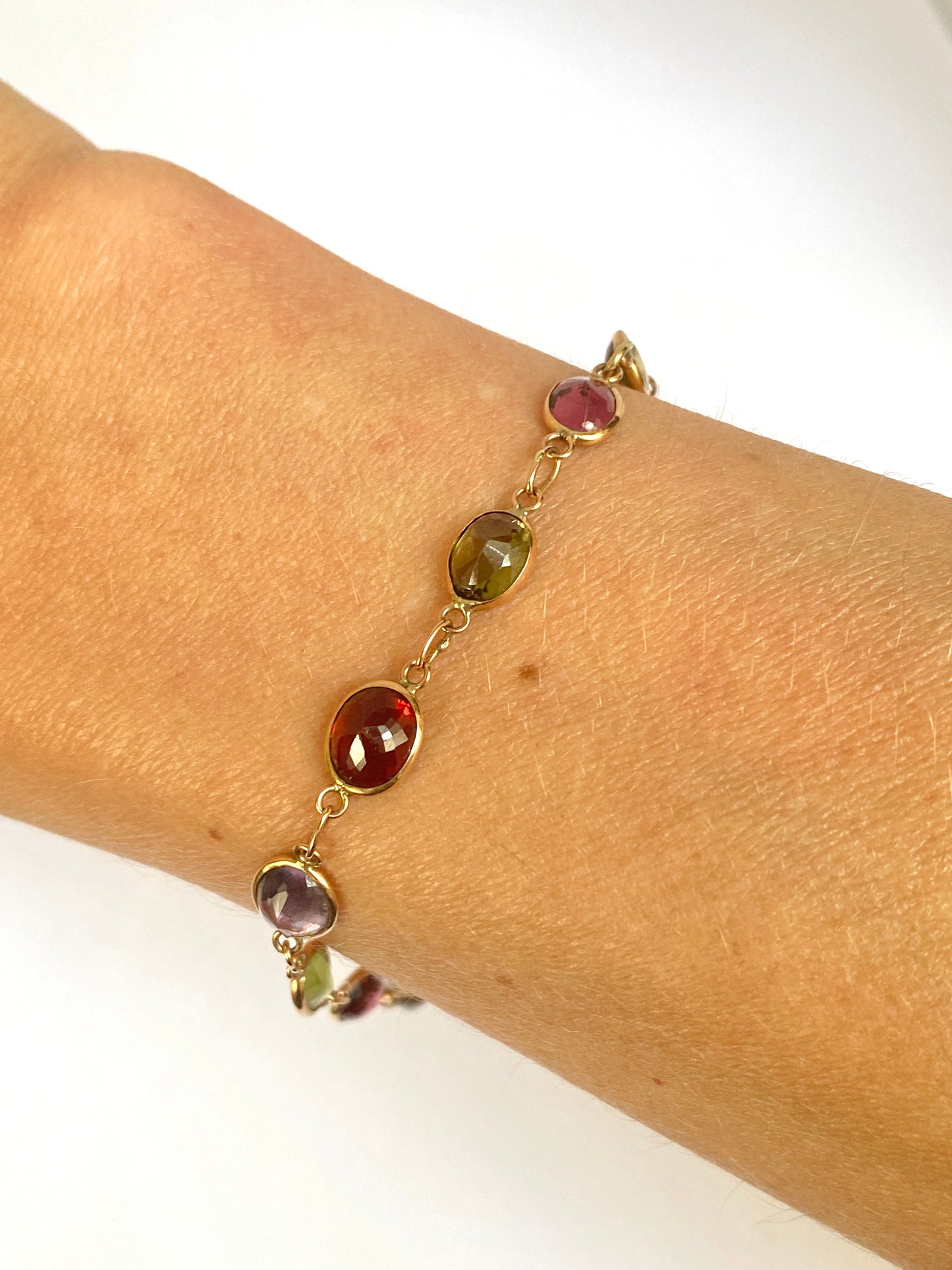 Vintage, 9ct Gold, Multi Gem Bracelet featuring, Peridot, Garnet, Amethyst, and Zircon