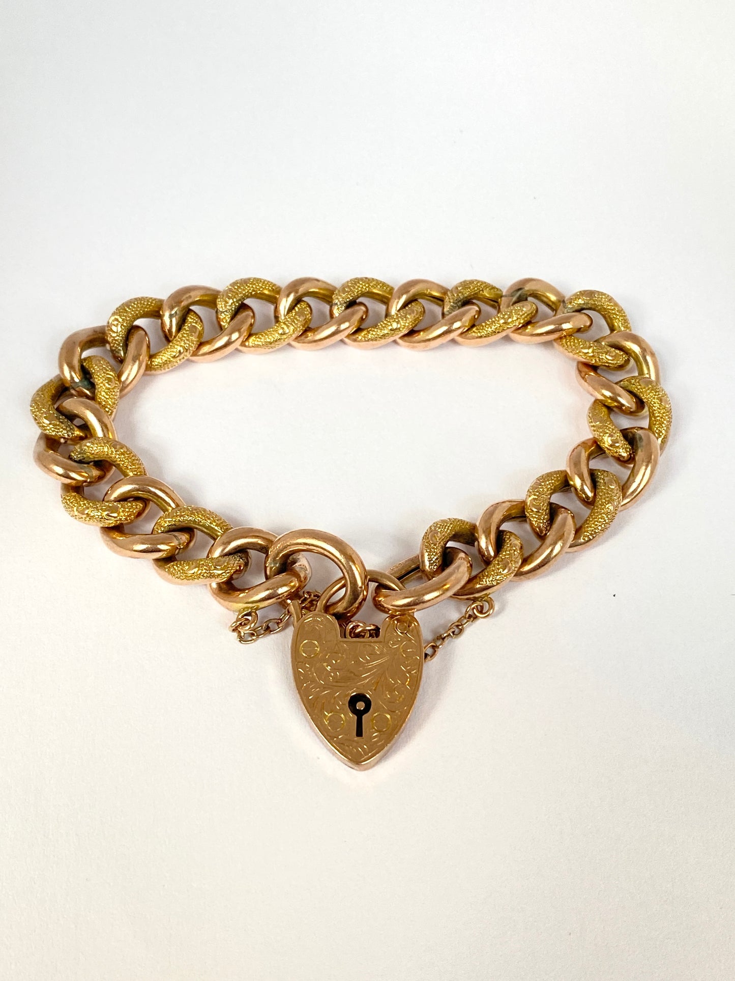 9ct Gold, Victorian Chased Bracelet with Engraved Heart Padlock Clasp, 23g and 7 inches