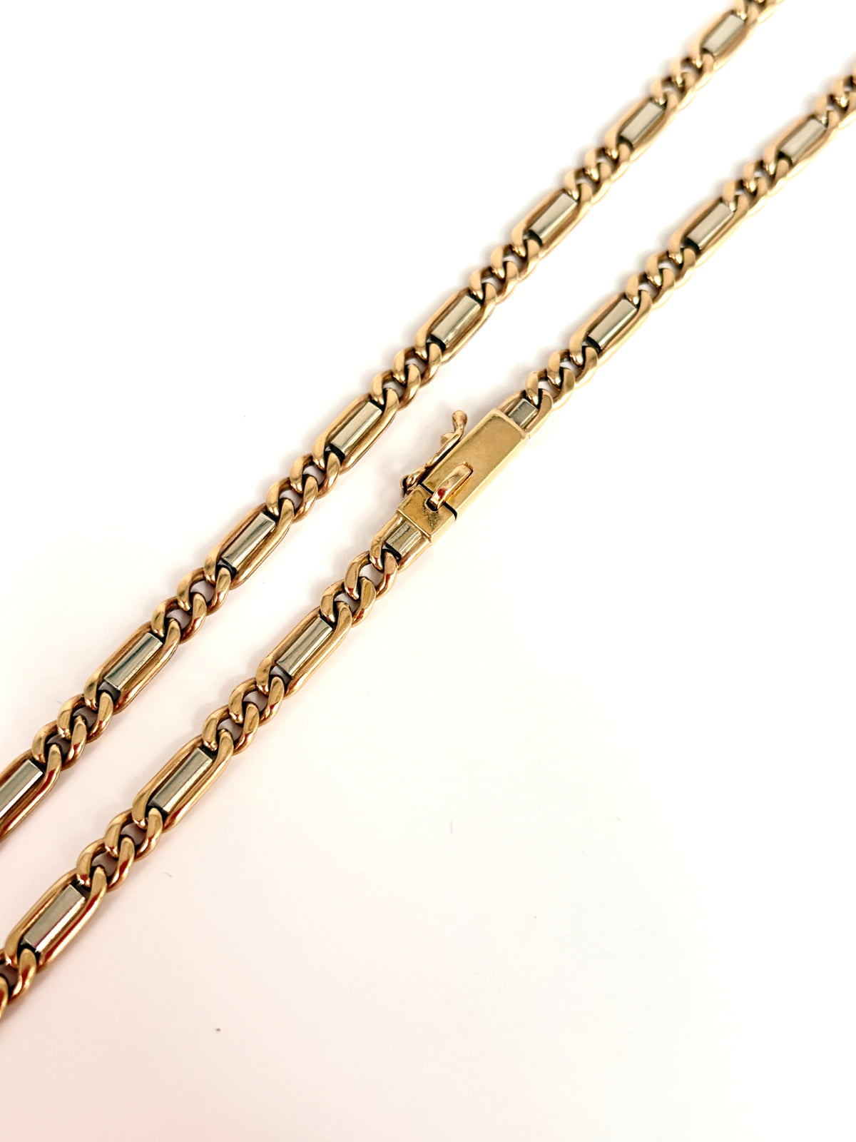 18 inch, Vintage, 9ct Yellow and White Gold Figaro chain, 24.60g