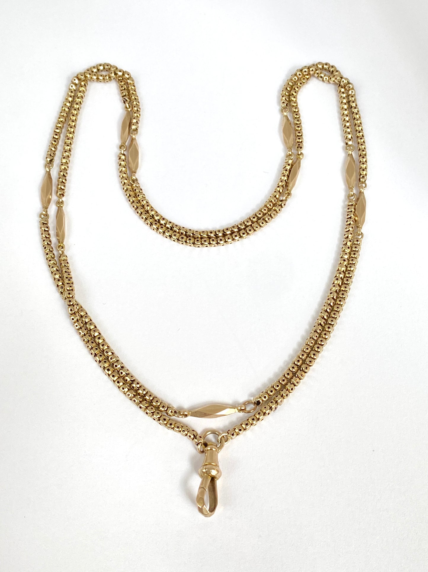 Antique, 9ct Gold Victorian Pierced Link Long Guard chain with faceted stations, 32 inches, 13g