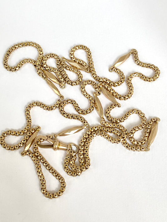 Antique, 9ct Gold Victorian Pierced Link Long Guard chain with faceted stations, 32 inches, 13g