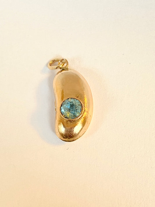 9ct Gold, Antique, Kidney Bean Lucky Charm, with bezel set Aquamarine