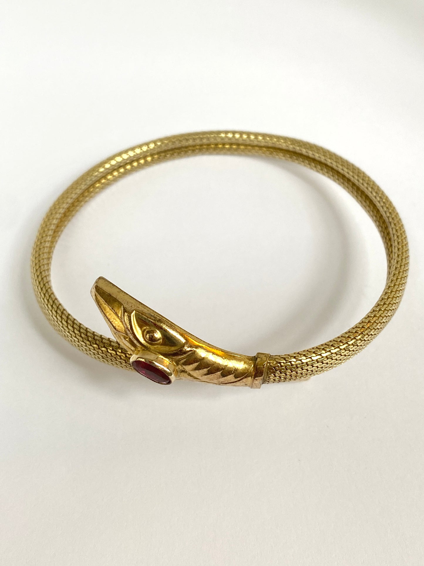 Incredible Art Deco, Extendable Snake Bangle with Ruby Paste, Hallmarked for Rolled Gold.