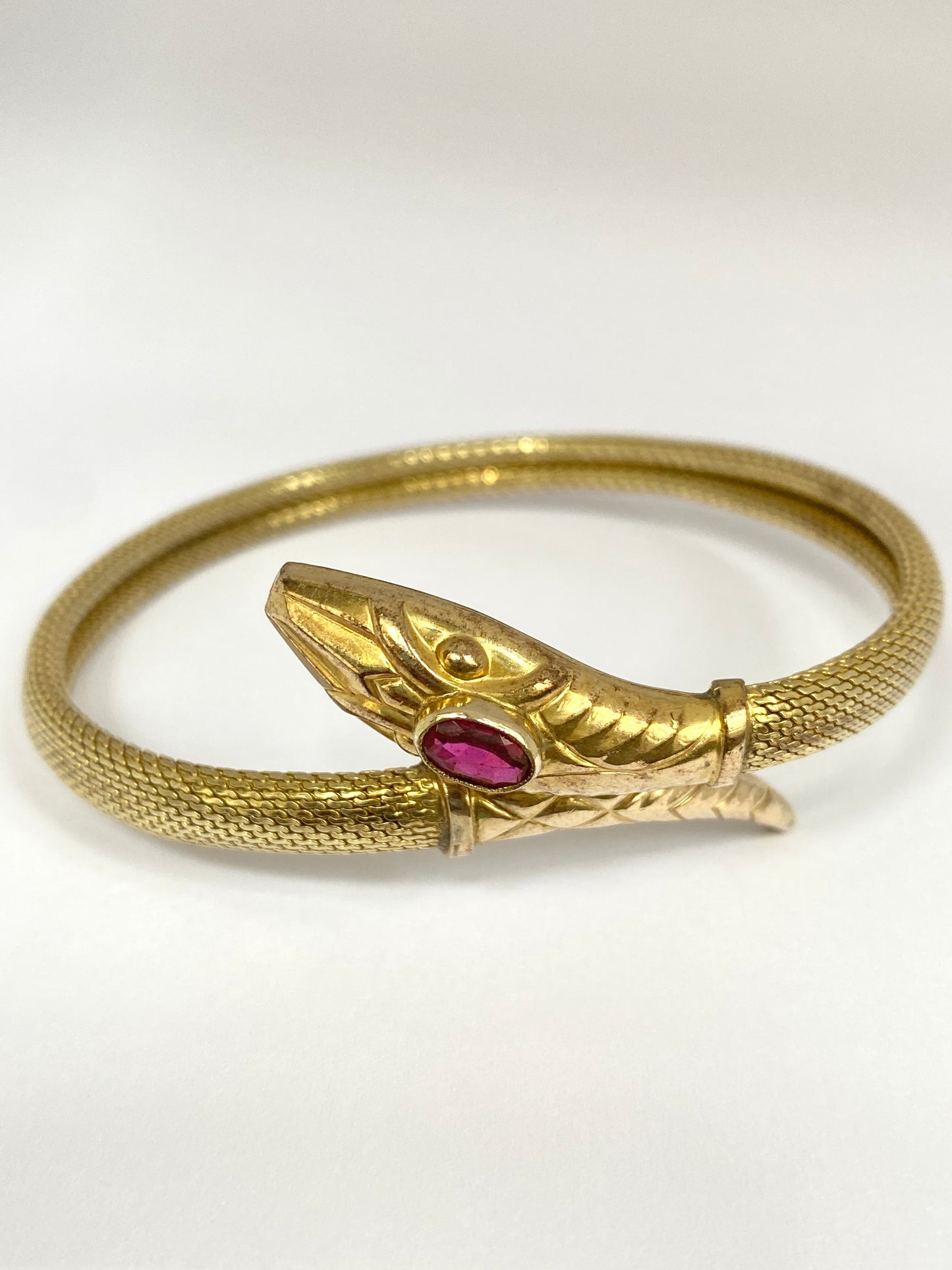 Incredible Art Deco, Extendable Snake Bangle with Ruby Paste, Hallmarked for Rolled Gold.