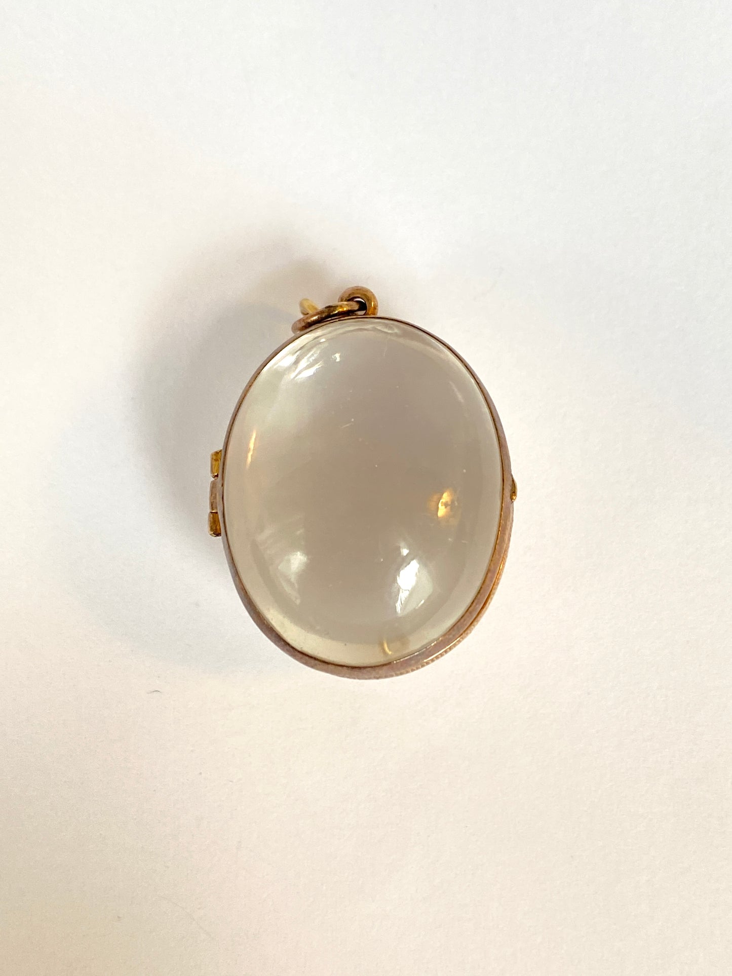 Pool of Light Crystal Pendant/Locket