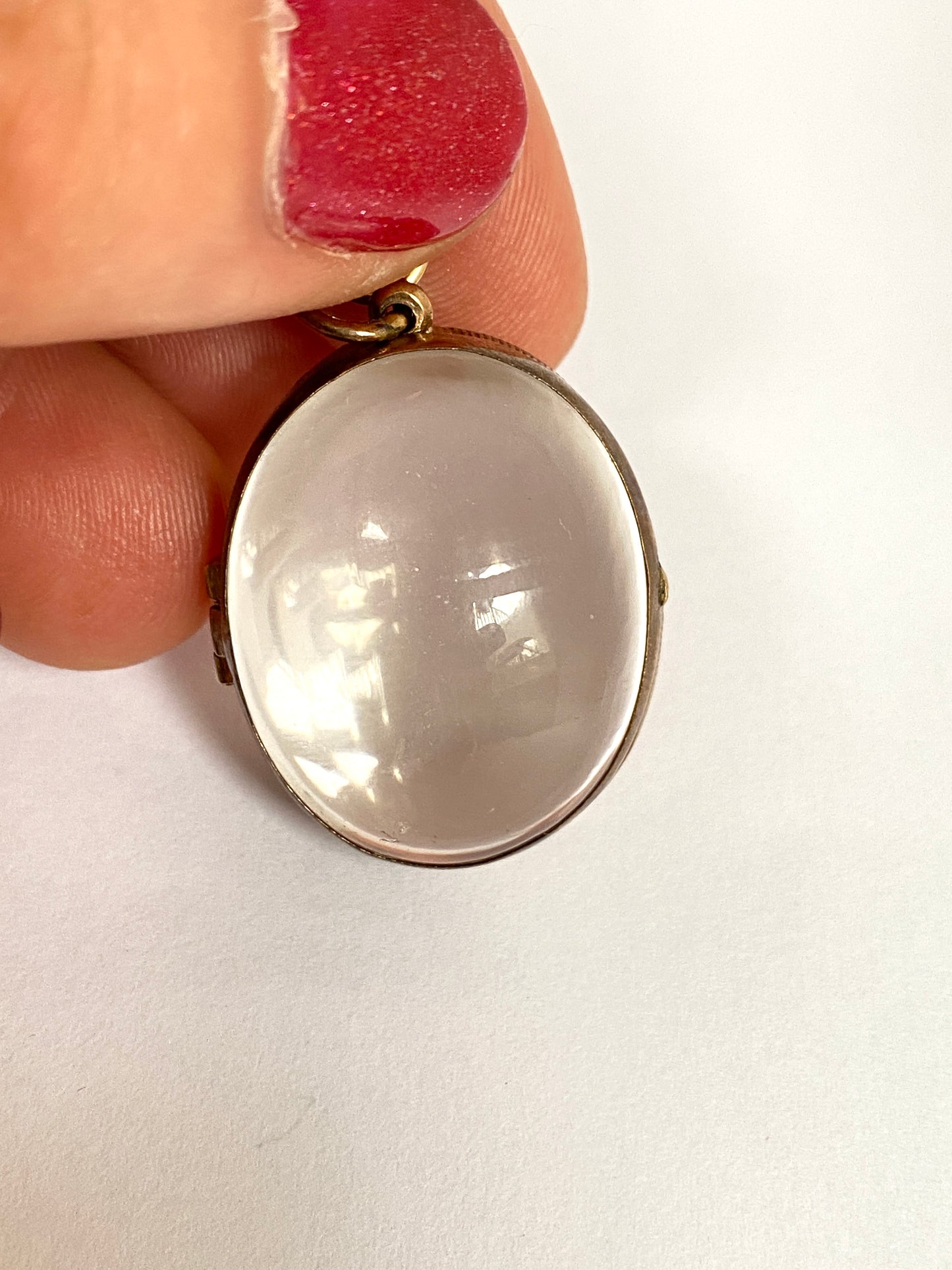 Pool of Light Crystal Pendant/Locket