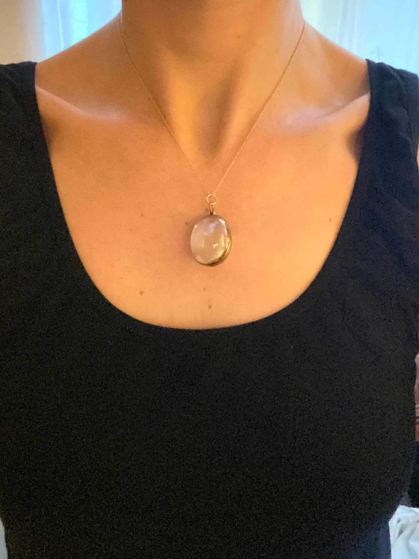 Pool of Light Crystal Pendant/Locket