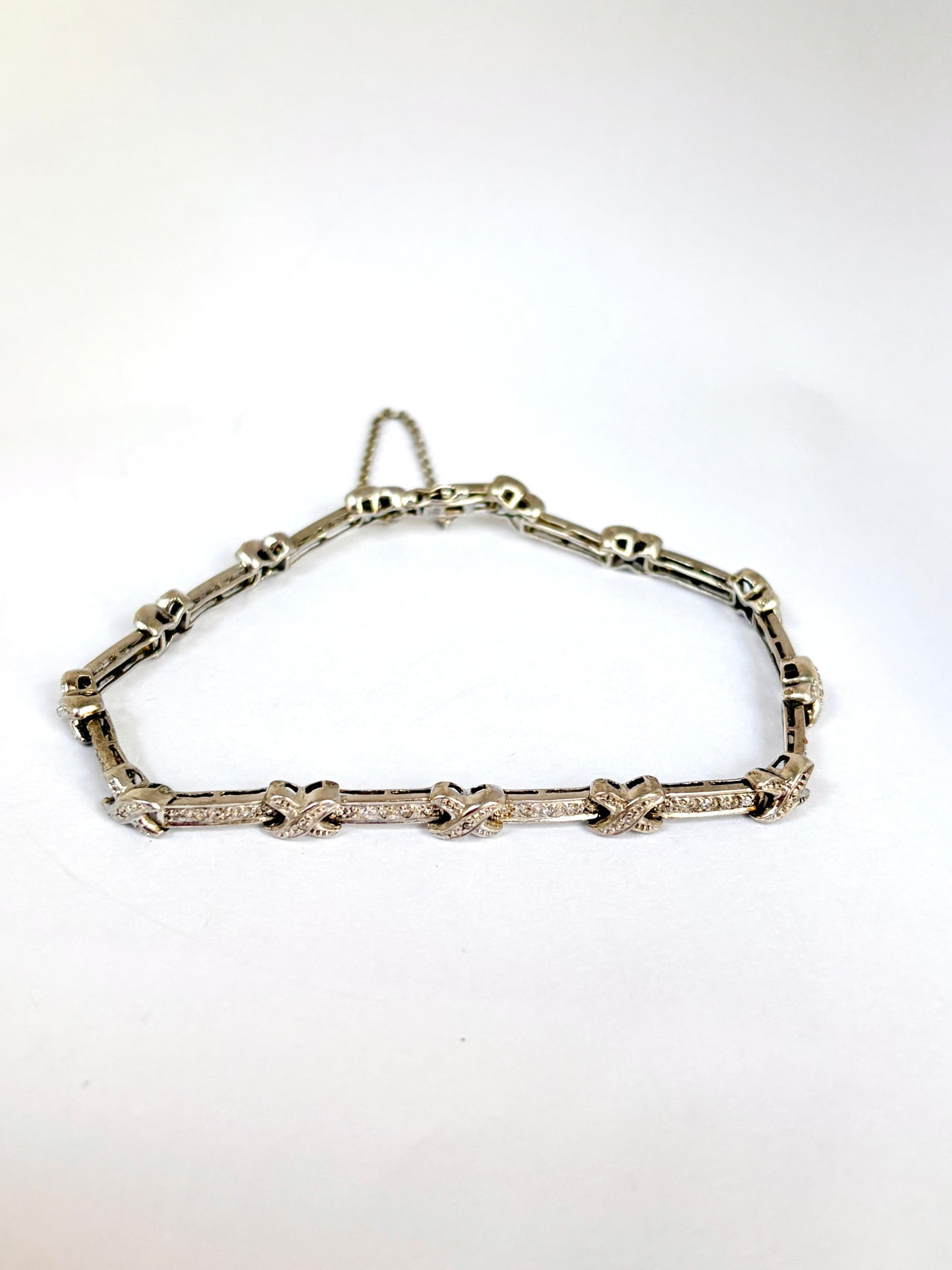 Vintage, 9ct Gold Diamond 'Kiss' Bracelet; 11.50g, 7.5 inches