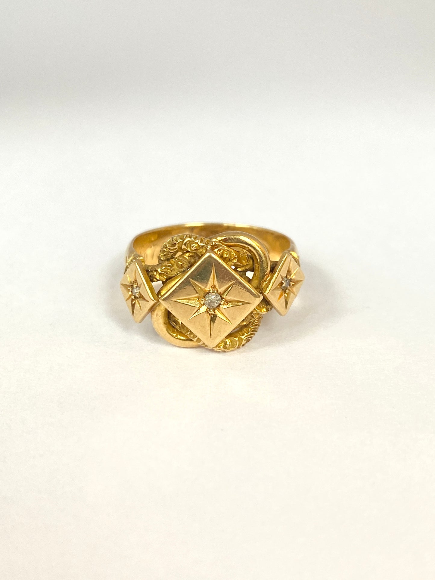 FINAL PAYMENT, 18ct Gold Diamond Lovers Knot Ring featuring, Hallmarked 18ct Gold, London 1918 (7.37g)