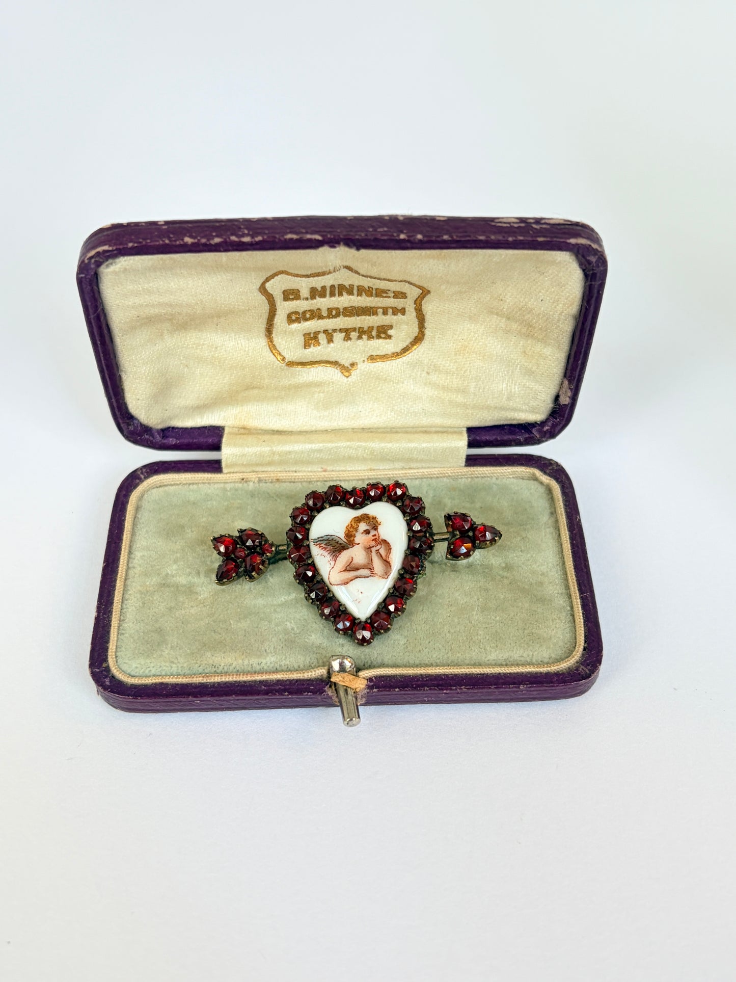 Antique Victorian, Silver and Garnet Cupid Arrow Brooch, with antique box