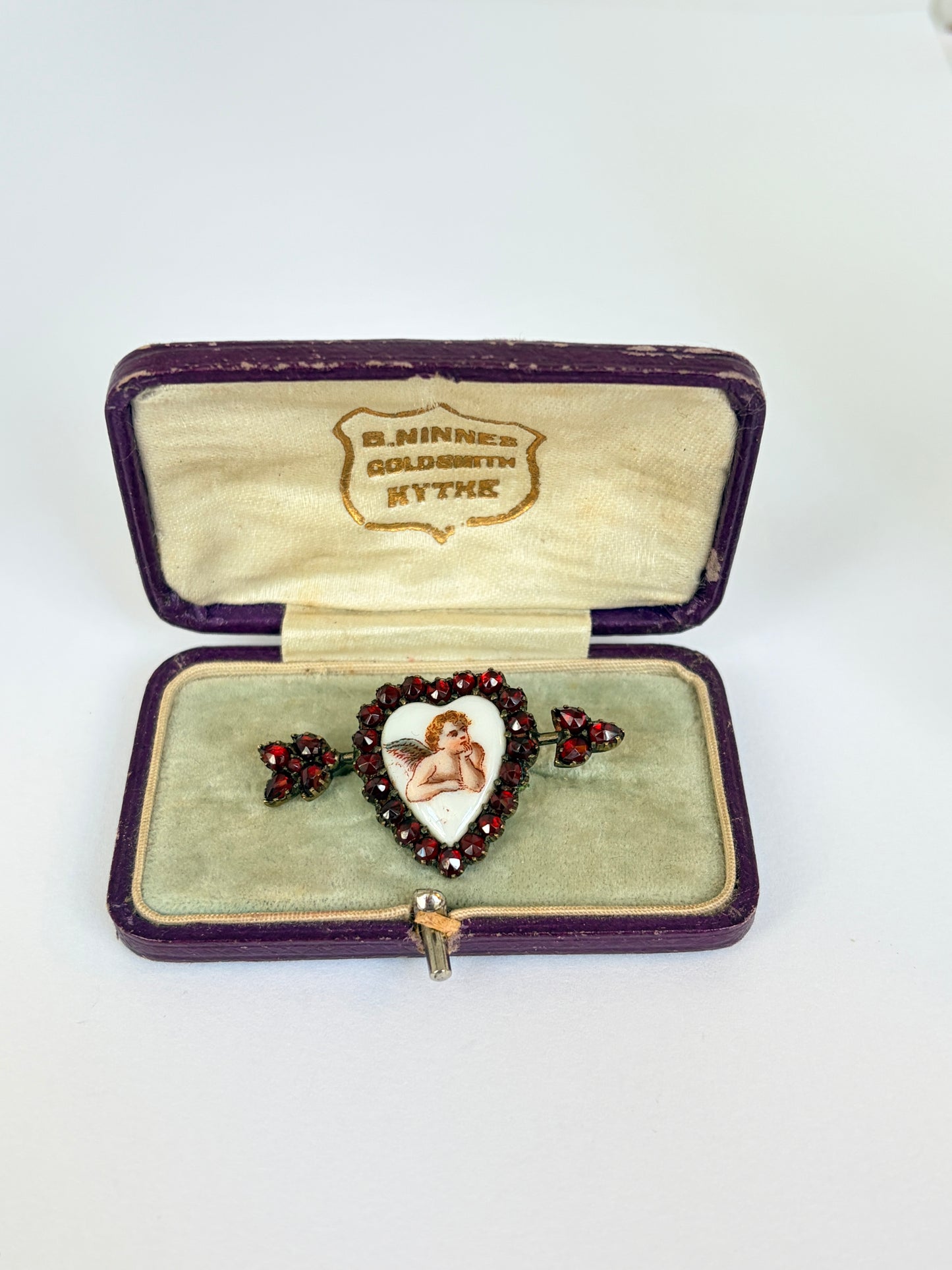 Antique Victorian, Silver and Garnet Cupid Arrow Brooch, with antique box