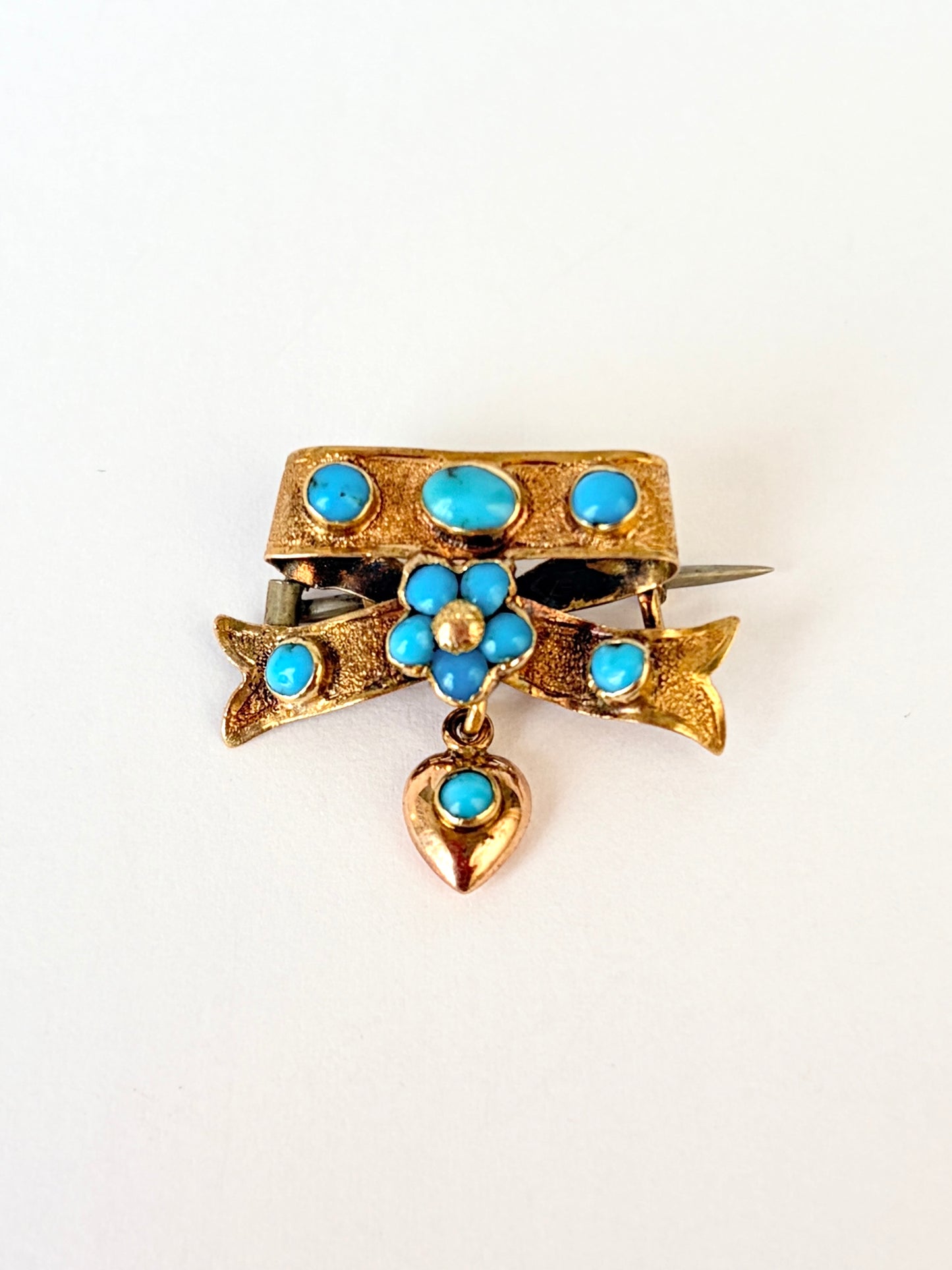 Victorian, 15ct Gold Turquoise Bow with hanging heart