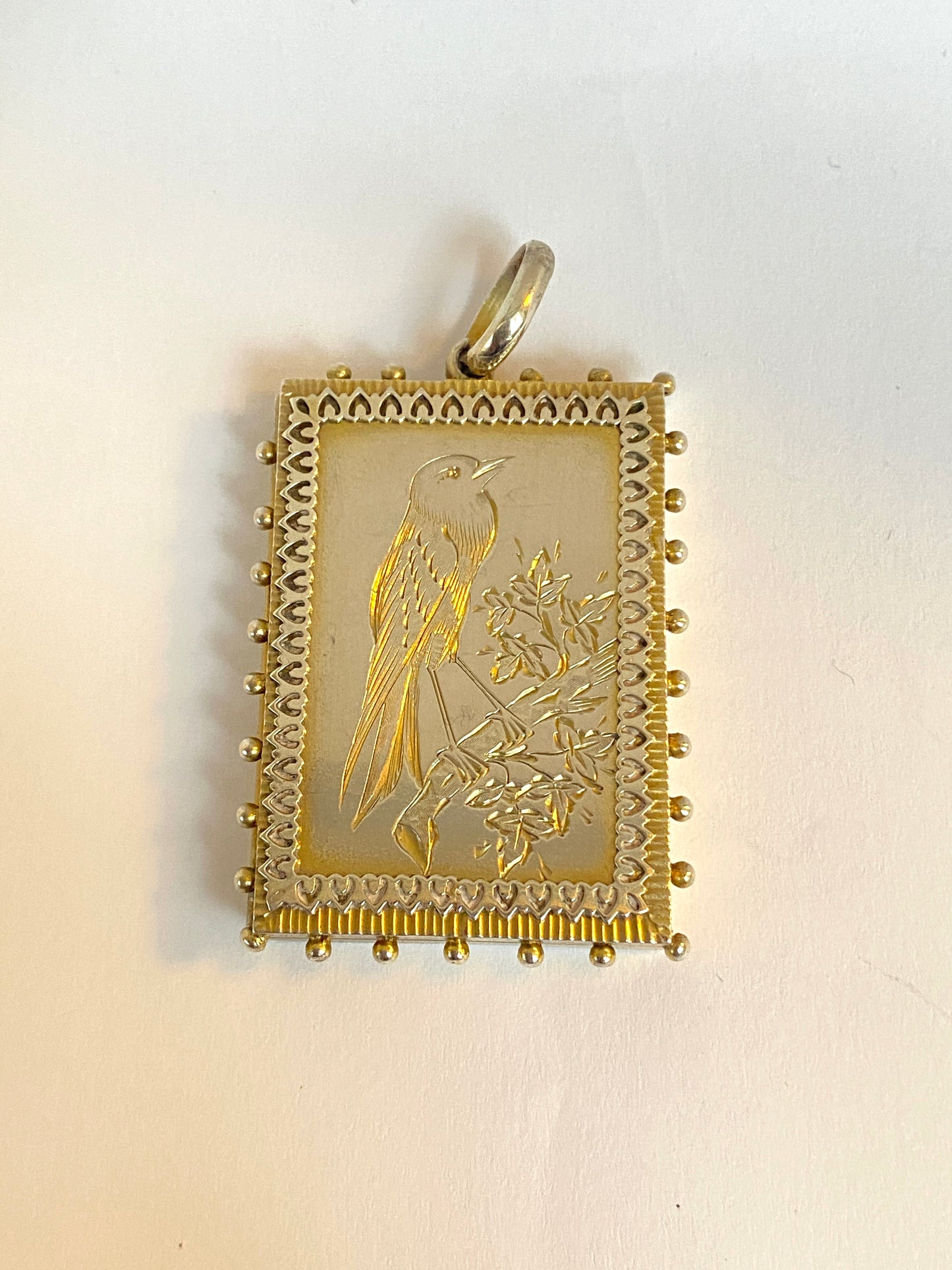 Victorian, Solid Silver and gold gilt, Rectangle Aesthetic Movement Sweetheart Bird locket